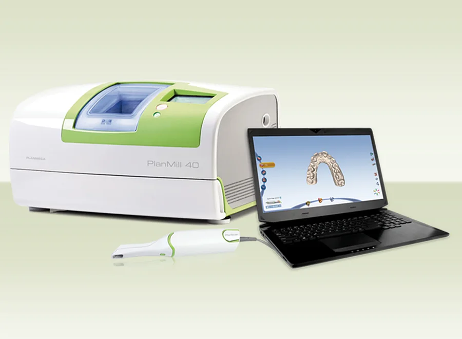 In-office milling unit and intraoral scanner used to design crowns